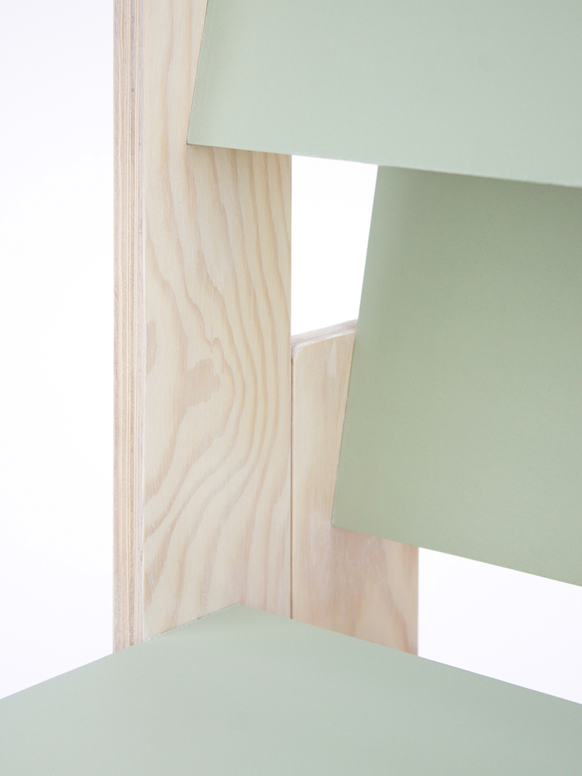 a pair of twin wooden chairs by A204 reconfigure into tables with drawers and shelving units