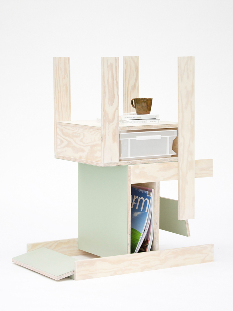 a pair of twin wooden chairs by A204 reconfigure into tables with drawers and shelving units