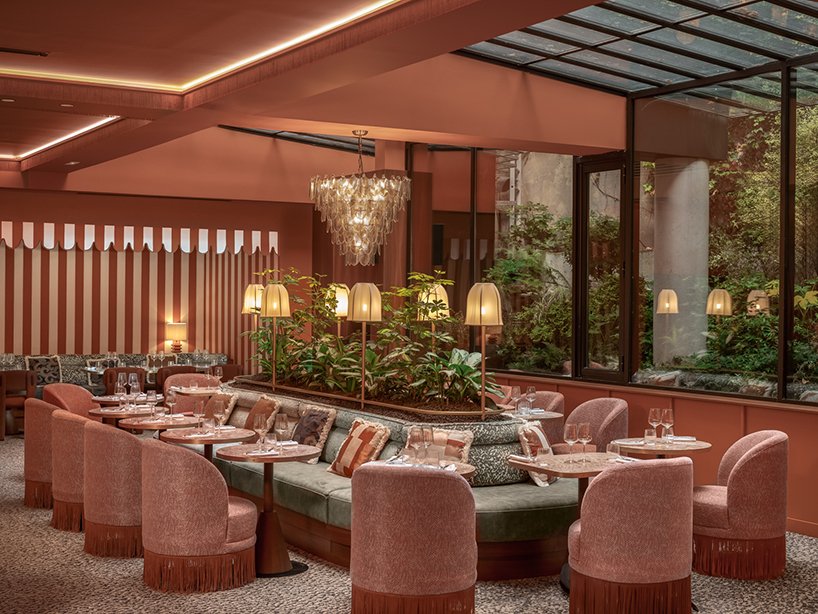 vibrant fabrics ornament restaurant interiors by maison malapert in paris fashion district