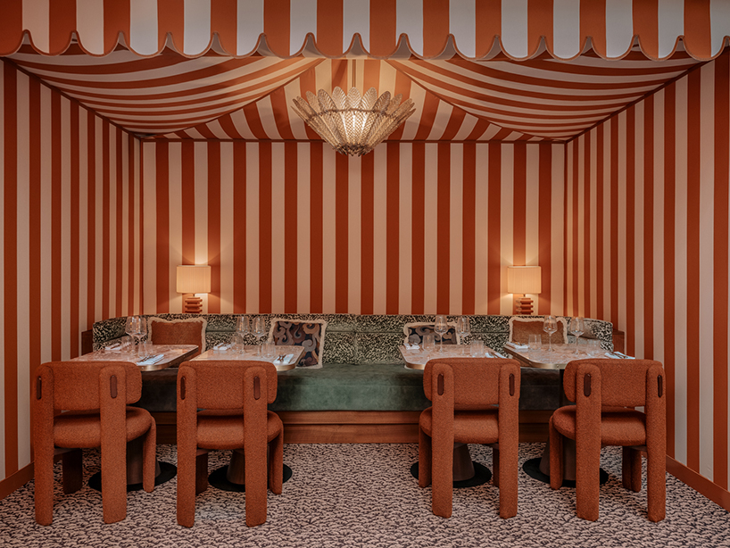 vibrant fabrics ornament restaurant interiors by maison malapert in paris fashion district