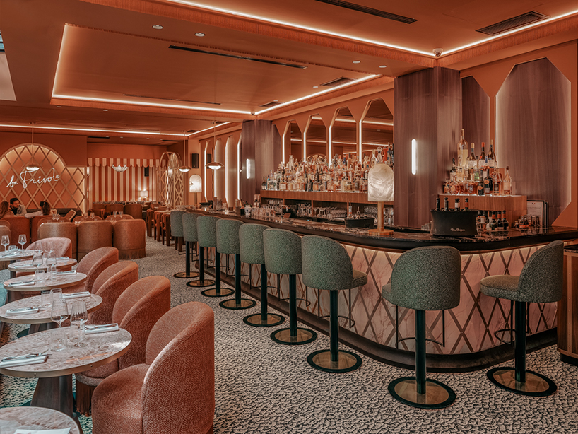 vibrant fabrics ornament restaurant interiors by maison malapert in paris fashion district