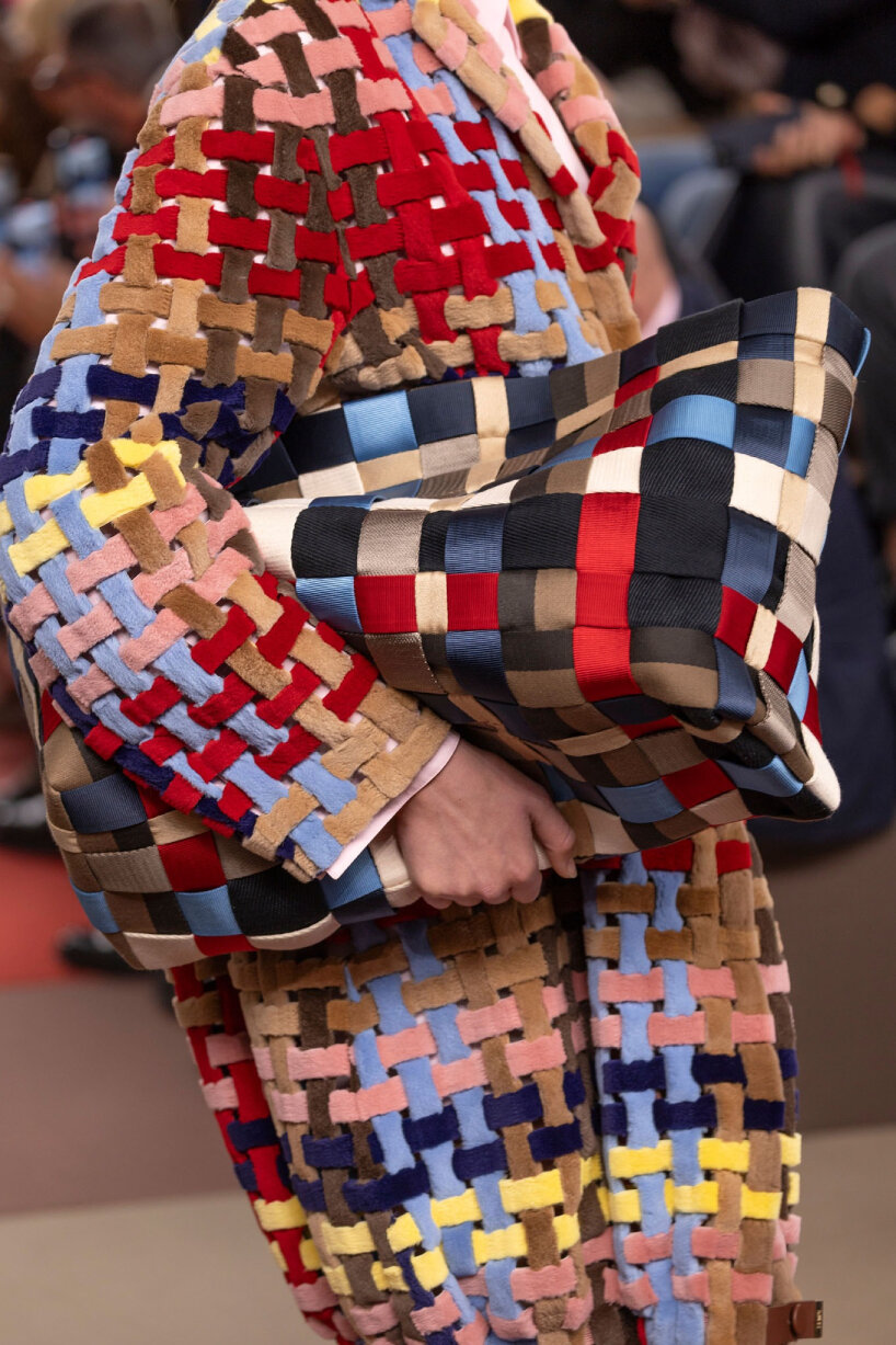 the field acts as a backdrop for the collection, some of which displays the same colors and patterns as the set