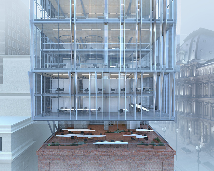 perforated metal panels clad office floating above st. louis’s century-old columbia building