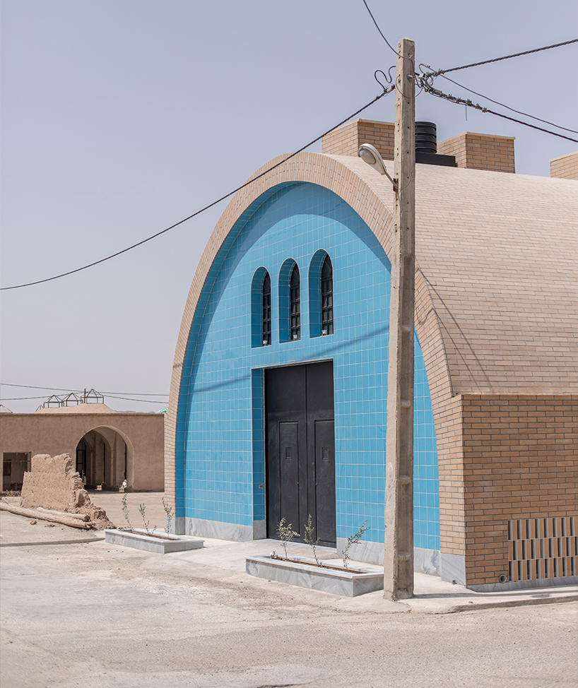 brick and turquoise tiles clad vaulted aghajoon communal kitchen in iran