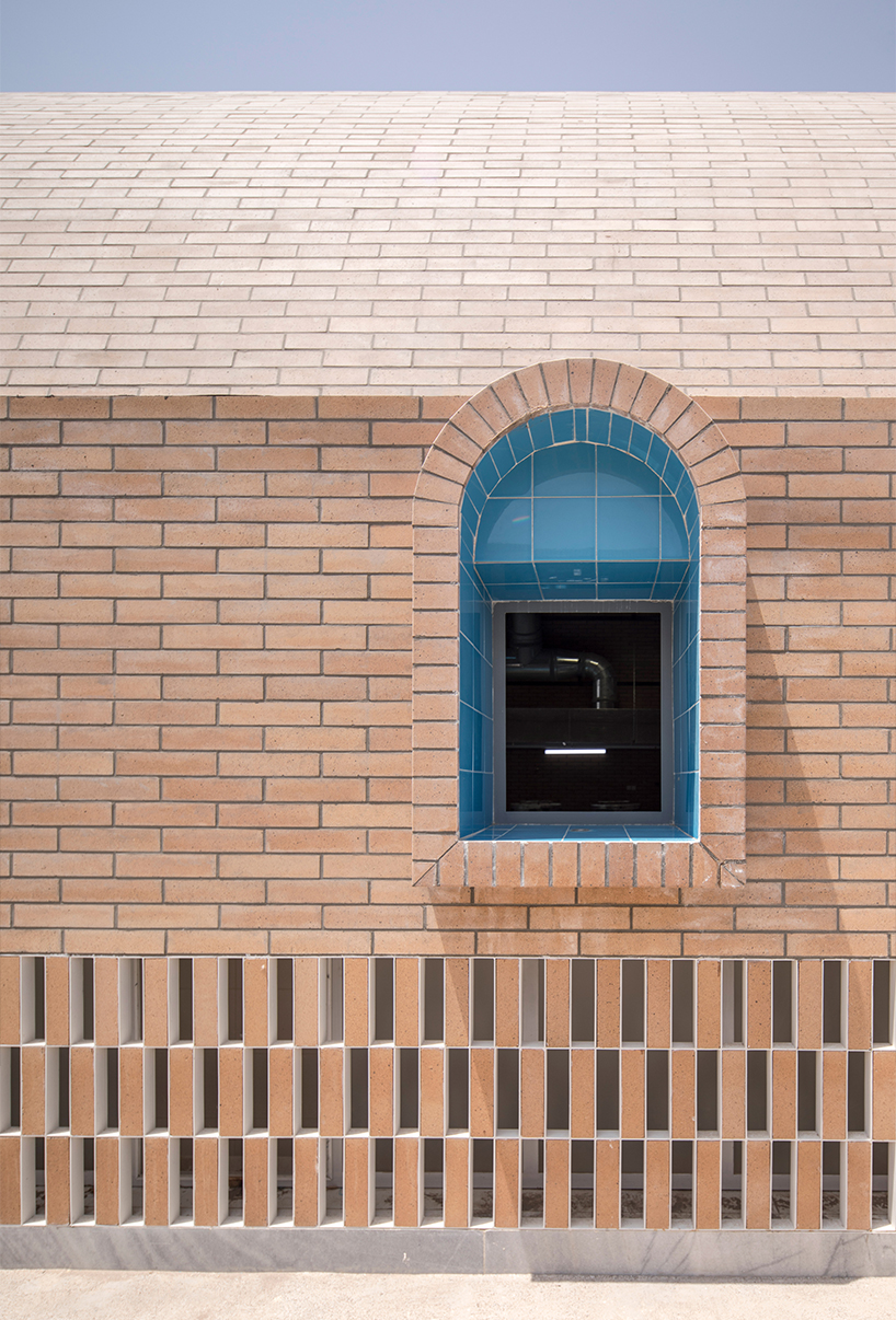 brick and turquoise tiles clad vaulted aghajoon communal kitchen in iran