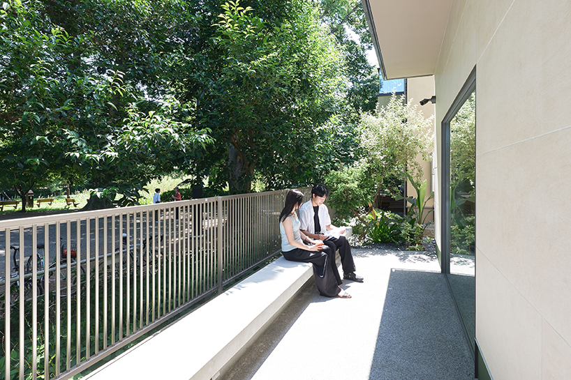 circular aperture welcomes natural light within gabled tokyo house by KIAS