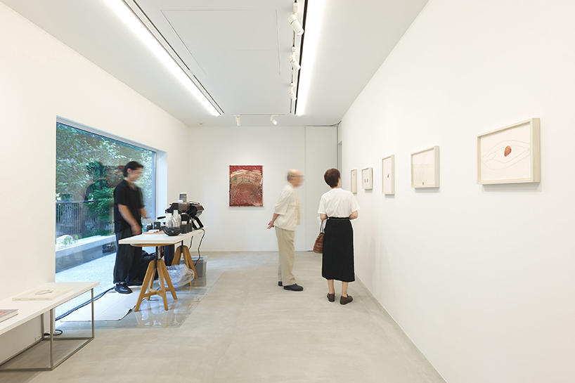 circular aperture welcomes natural light within gabled tokyo house by KIAS