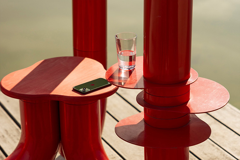 three-legged installation turns industrial gas pipes into intimate public shelter